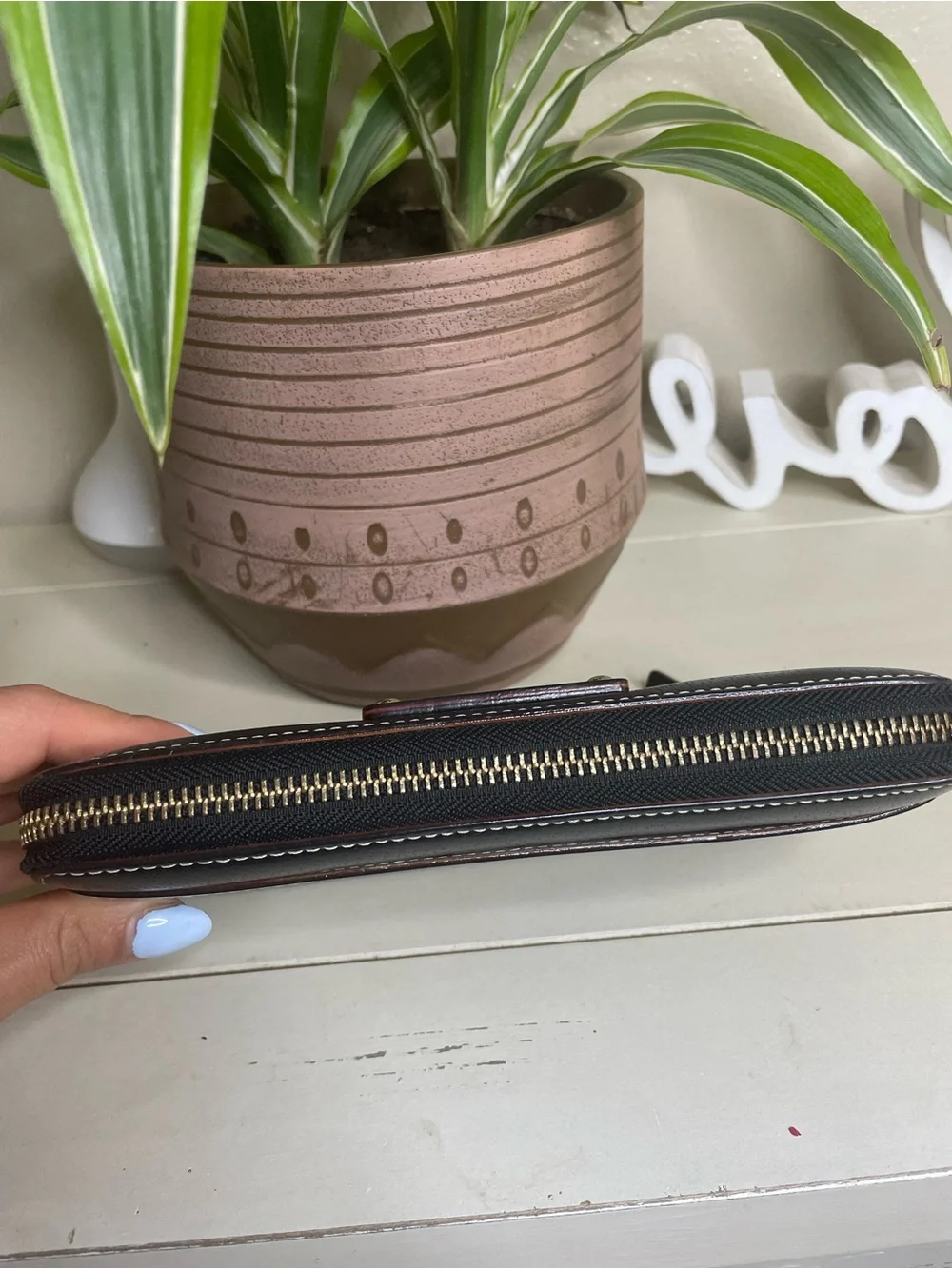 kate spade Black Pebbled Leather Zip Wallet with Gold Logo